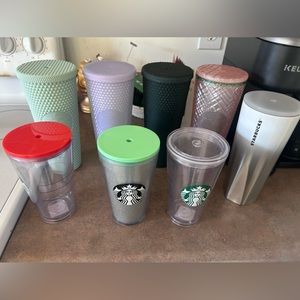 8 used Starbucks cups.